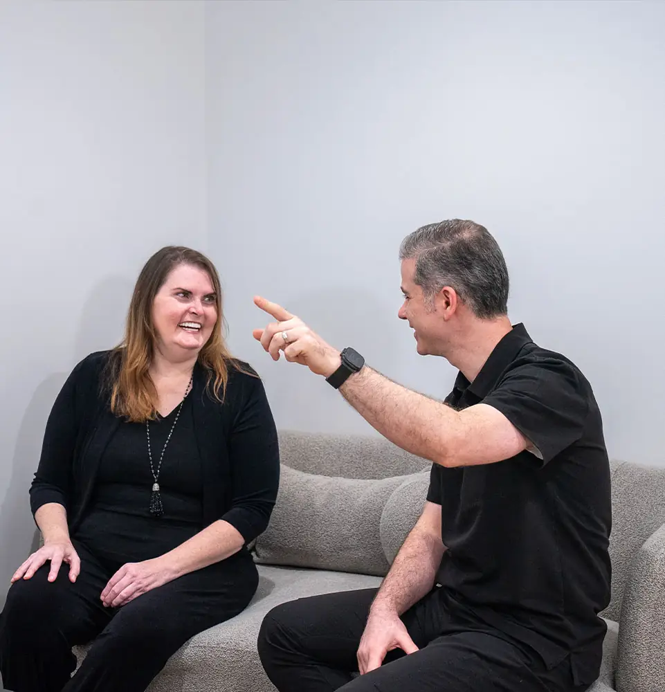 Doctor consulting with a dental implant patient at Next Smile+Implant