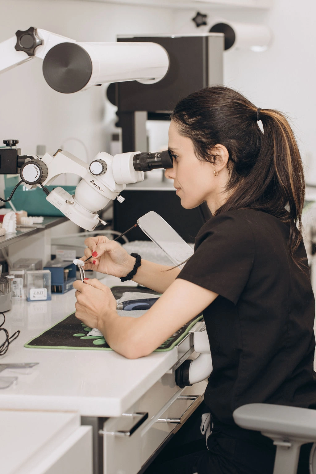 Dr. Rezaei working in the dental lab