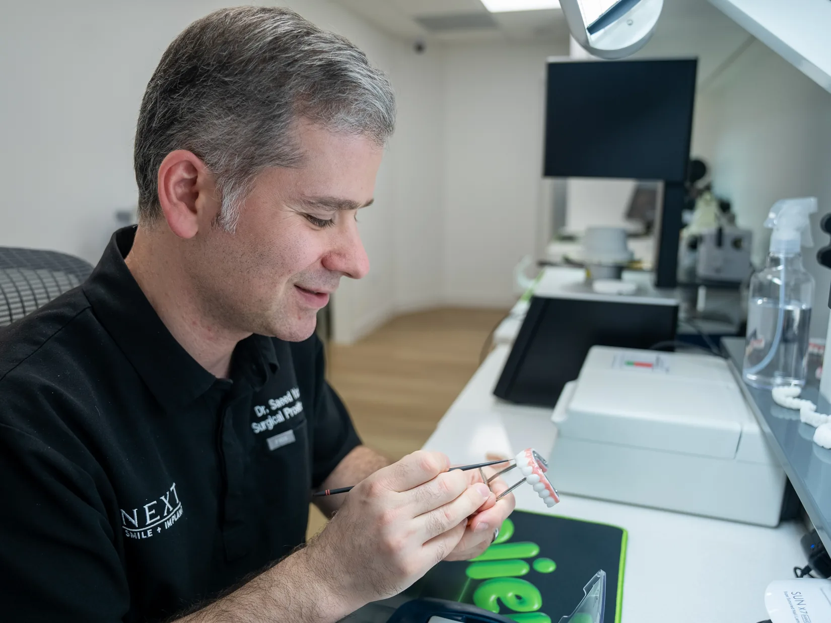 Dr. Saeed Yazdianpour working in the in-house dental lab